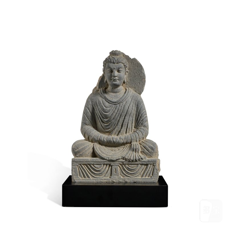 A gray schist figure of seated Buddha, Ancient region of Gandhara, 3rd / 4th century